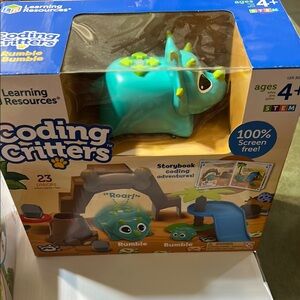 Blue Dinosaur Learning Toy with Expressive Eyes. For ages 4+